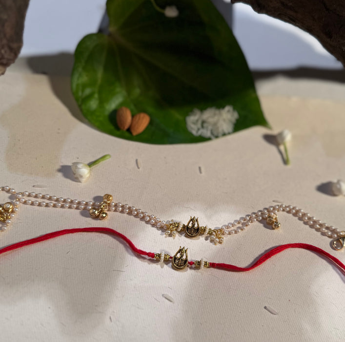 TRINETRA RAKHI & BRACELET (det of two)