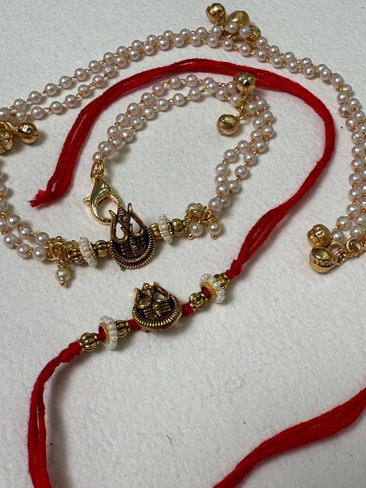 TRINETRA RAKHI & BRACELET (det of two)