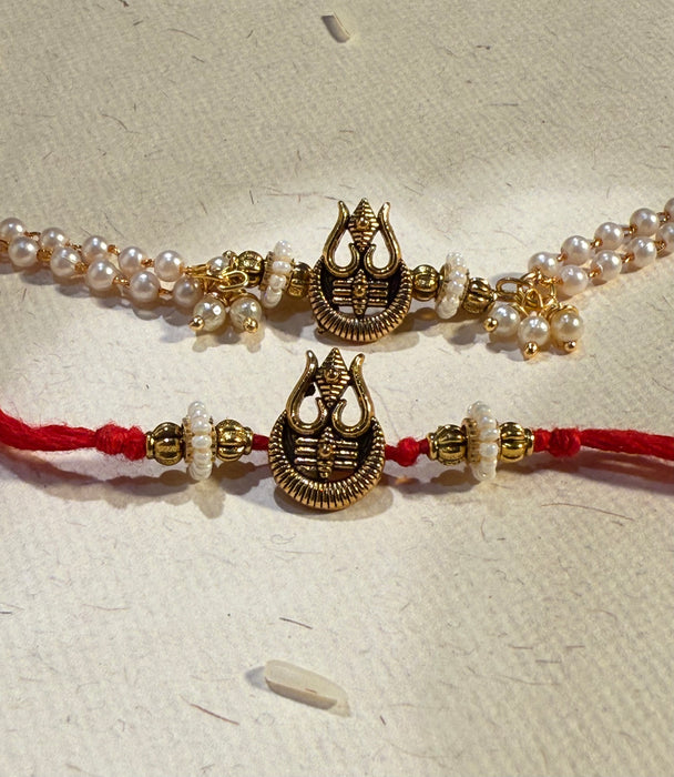 TRINETRA RAKHI & BRACELET (det of two)